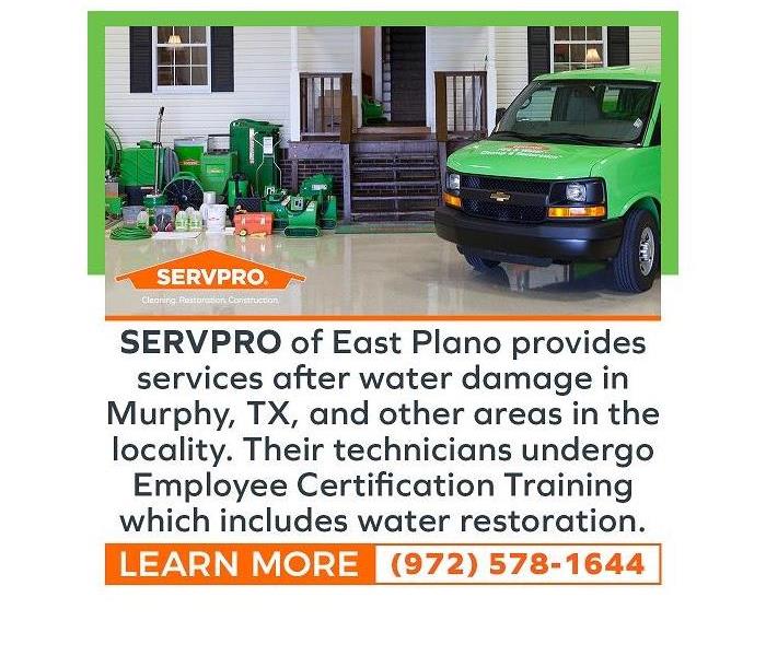 SERVPRO truck and equipment in front of a home